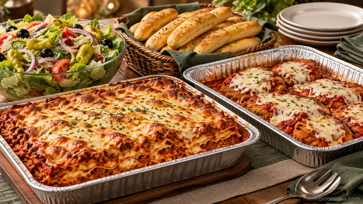 Olive Garden catering trays of lasagna and chicken parmigiana arranged for a group event